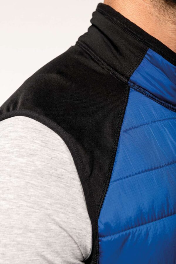 DUAL-FABRIC SLEEVELESS SPORTS JACKET